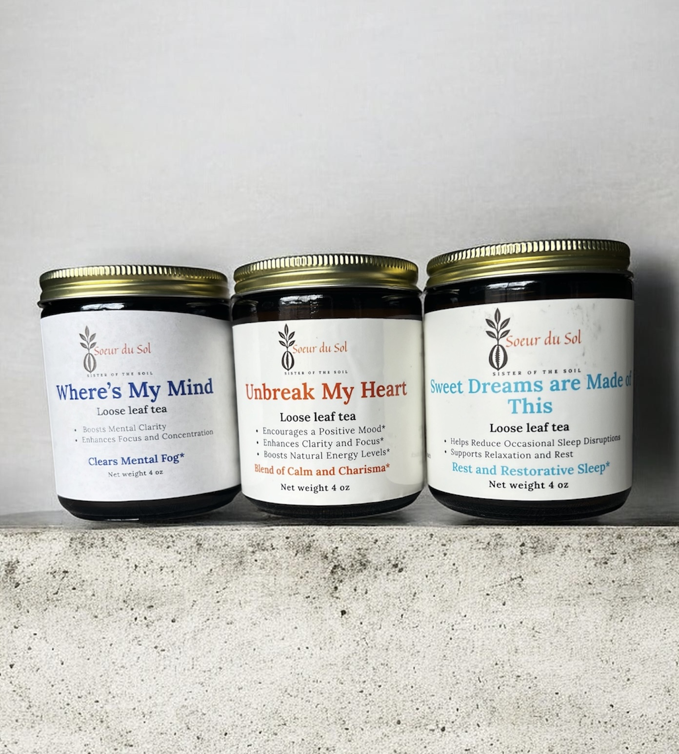 Soeur du Sol tea jars lined up with labels visible