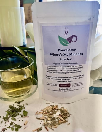 A bag od loose leafed tea with purple